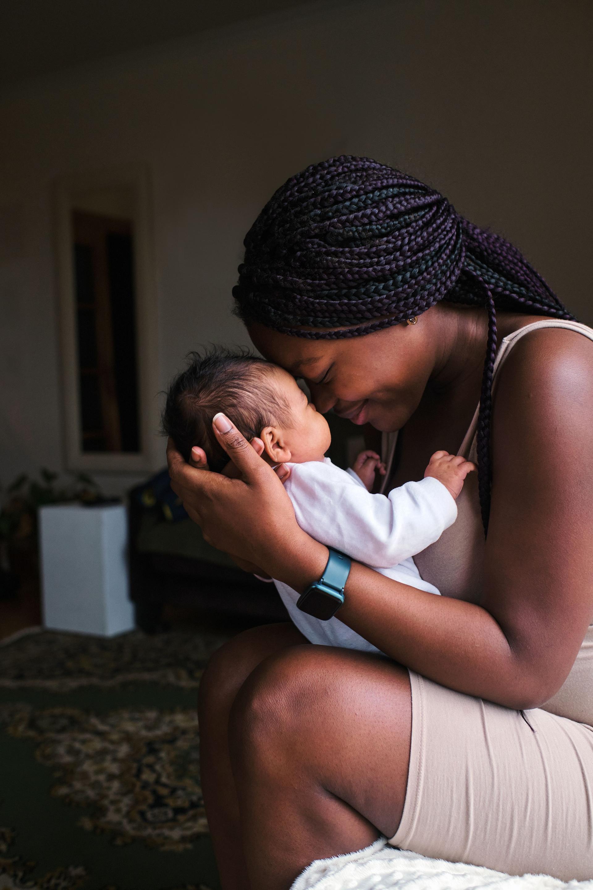 Tender scene of an african mother and a newborn